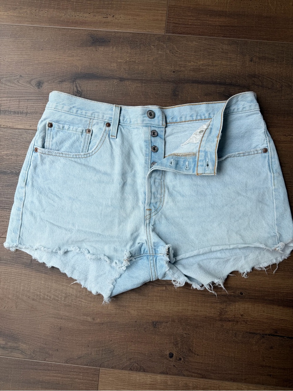 Levi’s High-Rise Light Blue Denim Cutoff Shorts with Button Fly